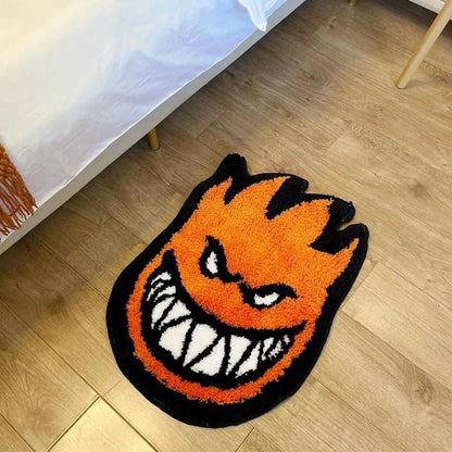 Tapete Chama Monster ao lado da cama sobre piso de madeira