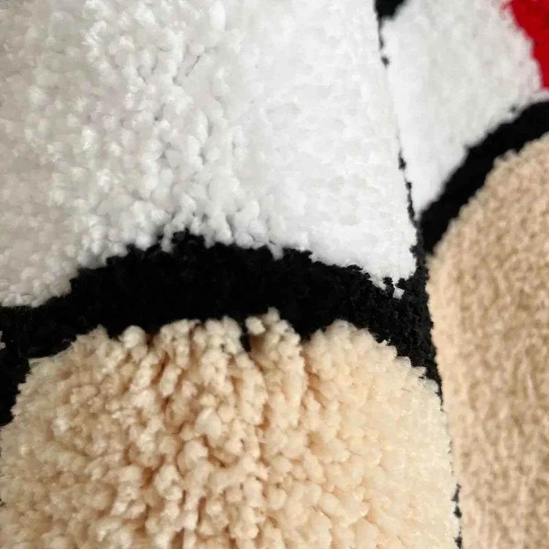 Detalhe da textura tufted macia do tapete Good Feels
